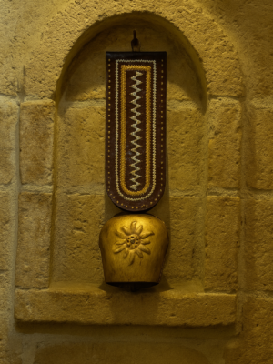 The Golden Chime: Handcrafted Copper Bell & Embroidered Leatherwork