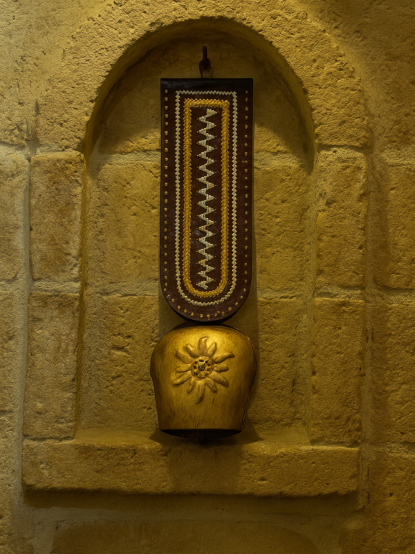 The Golden Chime: Handcrafted Copper Bell & Embroidered Leatherwork
